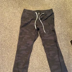 Vuori size small camo pants with drawstring and back pocket. Not stretchy.